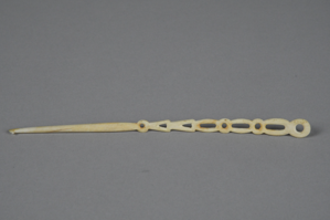 Image of Ivory crochet needle with 9 holes in handle