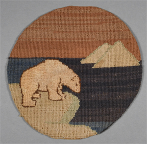 Image: Grenfell mat, small round hooked mat, with polar bear scene