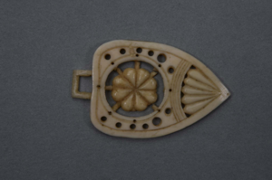 Image: Ivory pendant w/inner flower-shaped piece detached