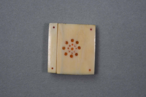 Image: Ivory square with inlay. 2 ivory pieces joined together with orange inlay (balee