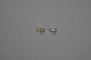 Image: Shiny cream colored pearls with 2 holes for stringing