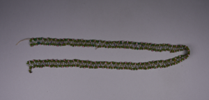 Image of Netted bead work strap. Green, milky, purple, pink. West Greenland.