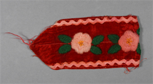 Image of Red felt band with pink trim. Pink and green floral pattern.