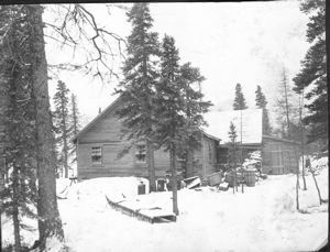 Image of MacMillan Scientific Station with sled in yard