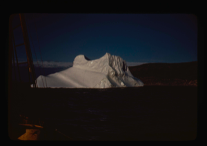 Image: Iceberg in sunset light. Ice cap beyond (2 copies)
