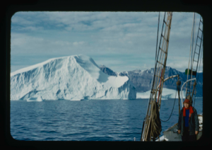 Image of Icebergs through rigging. Miriam MacMillan on deck (2 copies)