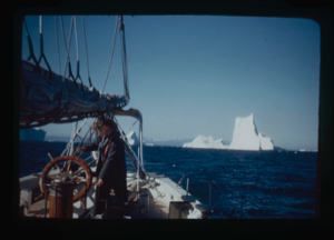 Image of Iceberg from the Bowdoin. Miriam MacMillan at wheel.