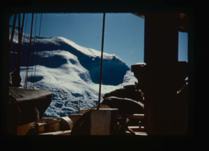 Image of The Bowdoin tied to an iceberg for water (2 copies)