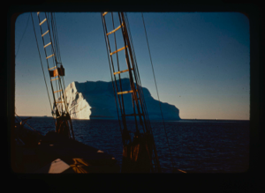 Image of Iceberg through rigging, in midnight sunlight (2 copies)