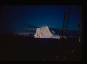 Image: Iceberg through rigging, in midnight sunlight (2 copies)