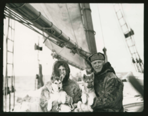 Image: Miriam and Donald MacMillan with Kahda and Alhningwah on the schooner Bowdoin