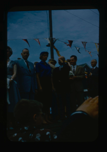 Image of Speakers' Platform on Departure Day. Includes Lowell Thomas, Donald MacMillan, n