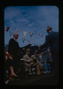 Image of Presentation on Speakers' Platform, Departure Day. Naval officers and others