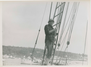 Image of Miriam MacMillan in rigging of schooner Bowdoin