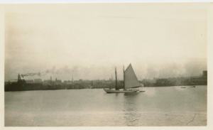 Image: schooner Bowdoin moored, one sail up