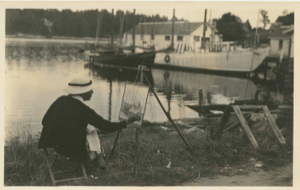 Image of Woman painting picture of the schooner Bowdoin