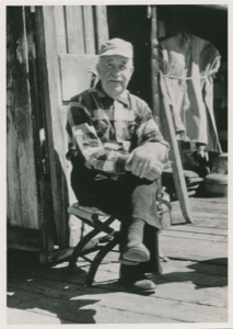 Image: Bertie Bangs sitting on a dock