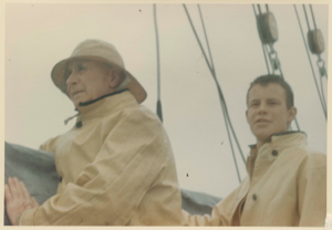 Image of Donald MacMillan and Peter Rand in foul weather gear