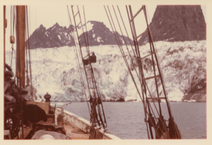 Image of Schooner Bowdoin close to a glacier