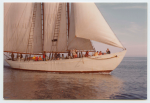 Image of Schooner Bowdoin under full sail. Guests aboard