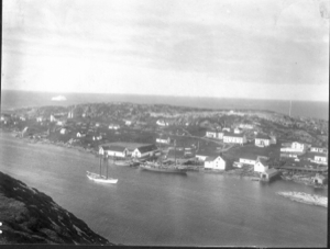 Image of Battle Harbor with Schooner Bowdoin and another boat moored