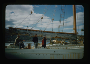 Image of Miriam (with camera) and Donald MacMillan, and ? on board (2nd copy not Hettasch