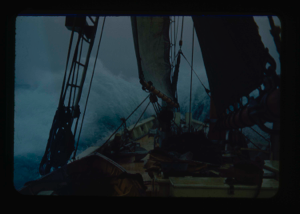 Image: The Bowdoin plowing into heavy seas, crossing to Greenland. (2 copies)