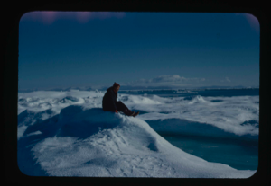 Image: Miriam MacMillan sitting on iceberg