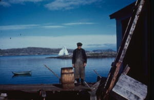 Image of Fishing master on dock (2 copies)