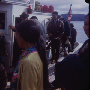 Image: Inuit men and women on fishing vessel