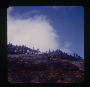 Image: Large group of people on rocks