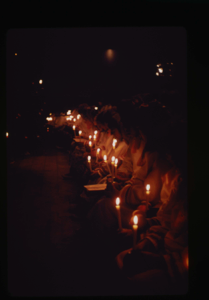 Image of Eskimo [Inuit] children at Christmas candlelight service. (3 copies)