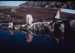 Image of Three Eskimo [Inuit] women doing wash