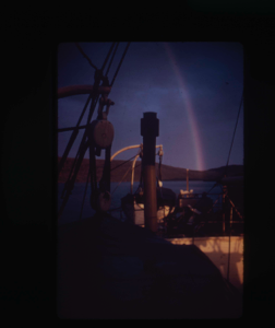Image: Rainbow over fishing boat