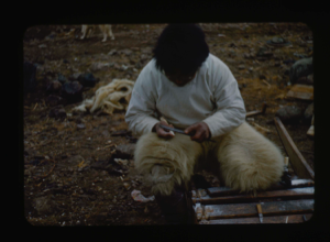 Image: Seated Eskimo [Inughuit] working on ivory (2 copies)