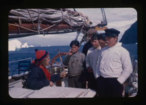 Image of Five Eskimo [Inuit] boys talking with Miriam MacMillan, aboard