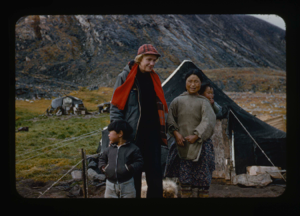 Image of Miriam MacMillan, Eskimo [Inuit] woman and children, beside tent