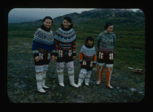 Image of Women and girl in beaded collars