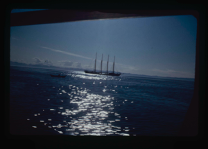 Image of Sun on water by 4-masted Portuguese fishing boat