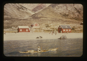 Image of Village of Sioropaluk from water. Kayaker