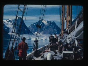 Image of Crew looking at glacier. (2 copies) Copyright N.G.S