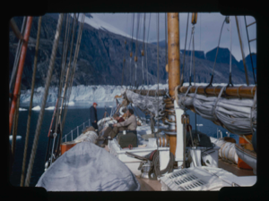 Image of Looking across deck to Rink Glacier. Miriam MacMillan and others on deck.