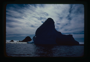 Image of Iceberg in silhouette, with cloud effect (2 copies)
