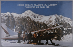 Image of Skiers beneath Alaska's Mt. McKinley [Denali] Talkeetna Air Taxi, Inc. (with message)