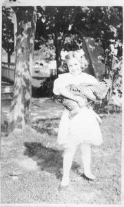 Image of Miriam Look holding pet hen