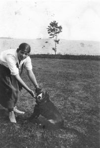 Image of Young woman and dog