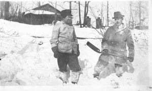 Image: Two men shoveling snow