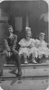 Image of Frederick, Laura, and Miriam Look on steps