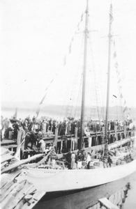 Image: Guests on The Bowdoin, and crowd on the dock