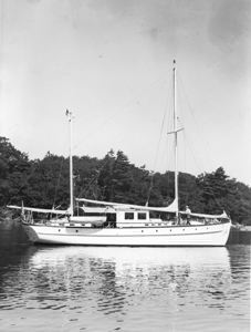 Image of Schooner moored with Jerome Look on deck